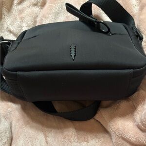 Sleek Black Crossbody Bag with Minimalist Design